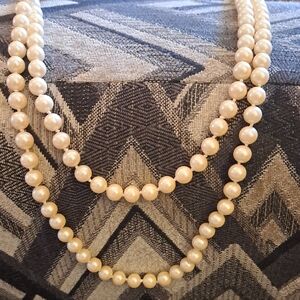 Classic White and Cream Pearl Necklace with Smooth Texture and Medium Length